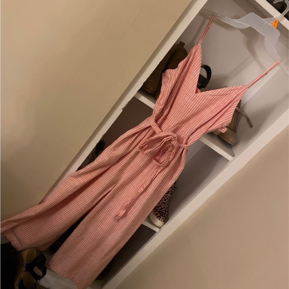 Size 12 striped Gianni Bini flared leg jumpsuit with matching belt